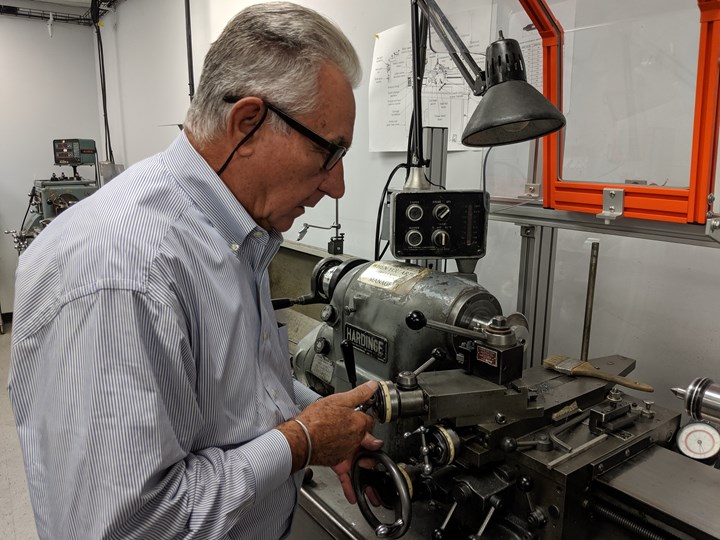 man working on custom machine